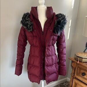The North Face Burgundy Puffer Jacket with Faux Fur